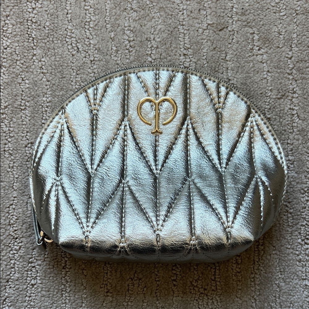 cle de peau Metallic Silver Quilted Cosmetic Case with Gold Emblem